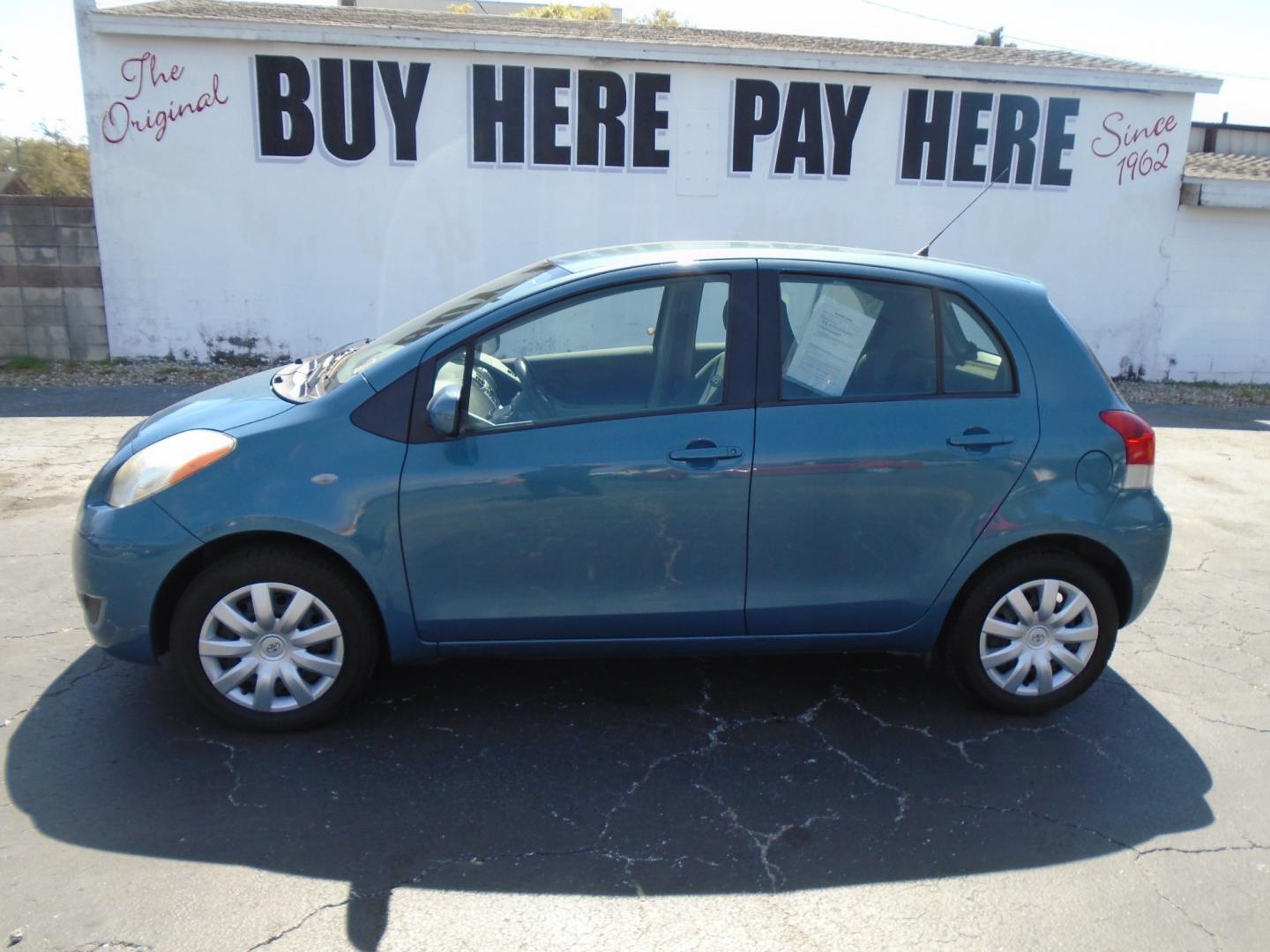 2010 BLUE /Grey Toyota Yaris Liftback 5-Door AT (JTDKT4K39A5) with an 1.5L L4 DOHC 16V engine, 4-Speed Automatic transmission, located at 6112 N Florida Avenue, Tampa, FL, 33604, (888) 521-5131, 27.954929, -82.459534 - Photo#0